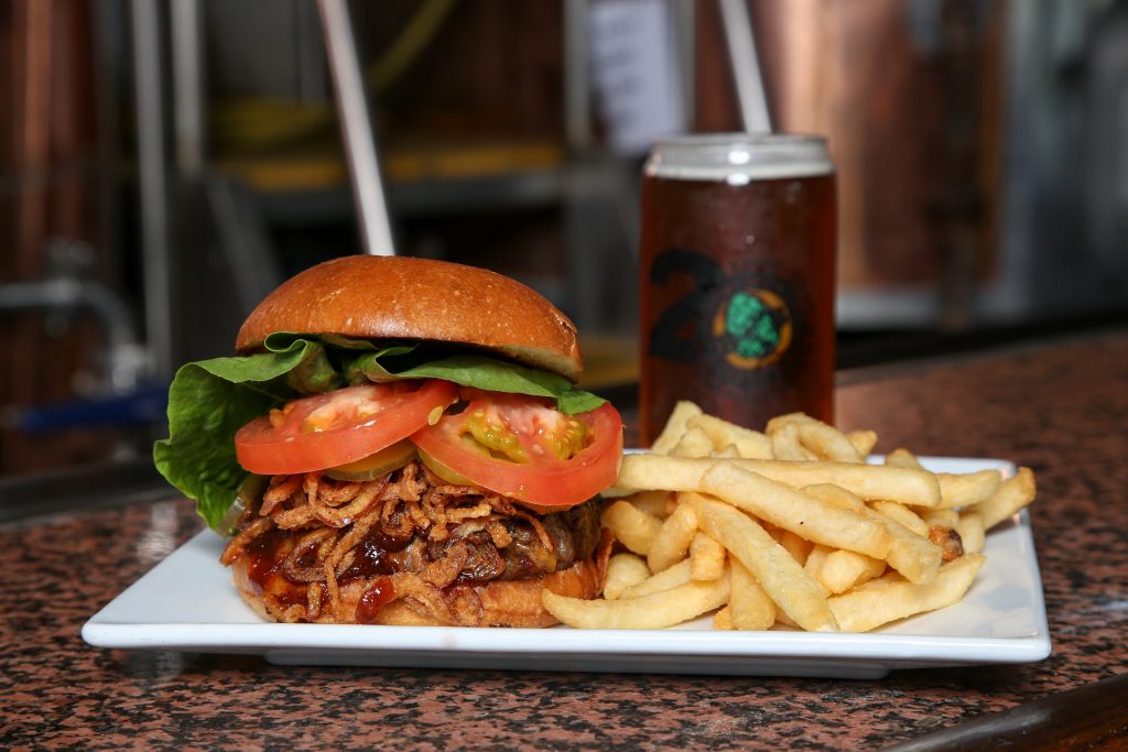 The loaded hickory burger and one of Brew Co.'s beers